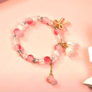 Pink and Gold Beaded Charm Bracelet with Bow Detail